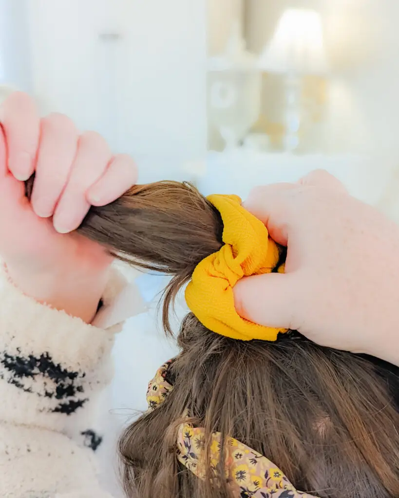 The photo of messy hair being tied with a yellow scrunchie showcases the 'imperfect' lifestyle shots we took for Okazon.